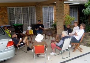 Volunteers relaxing after a working bee
